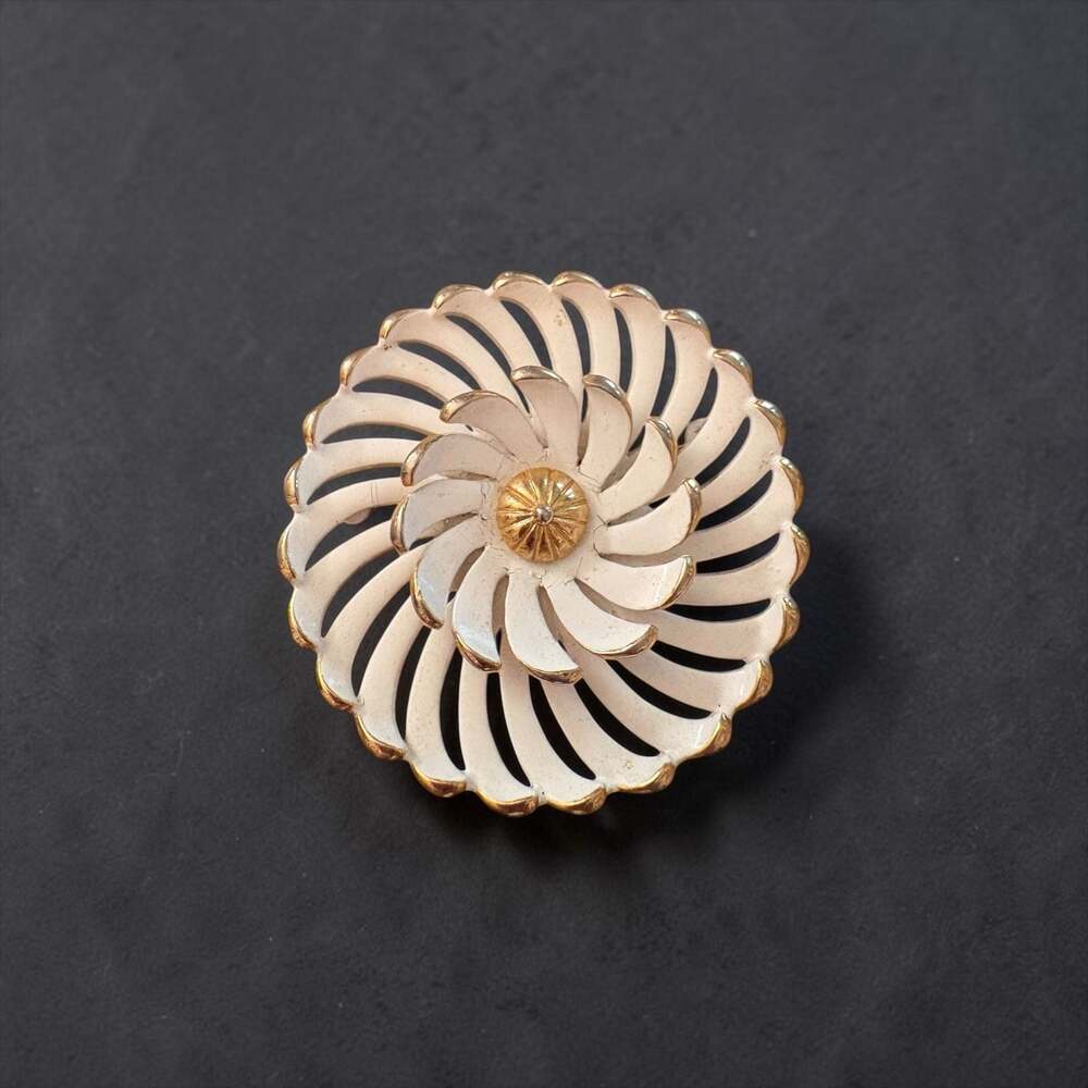 Vintage Monet Gold Tone and White Enamel Swirl Pinwheel Flower Brooch